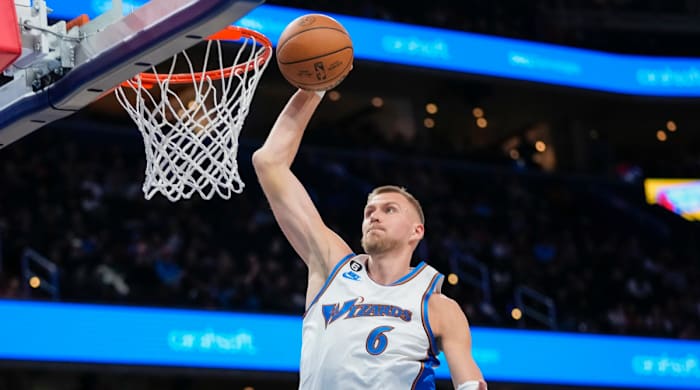 Wizards center Kristaps Porzingis goes up for a dunk during the first half vs. the Hawks.